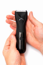 Laden Sie das Bild in den Galerie-Viewer, Zen Trimmer cordless men's body groomer held in hand, front view