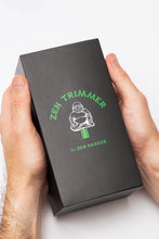 Laden Sie das Bild in den Galerie-Viewer, Hands holding the Zen Trimmer branded gift box packaging